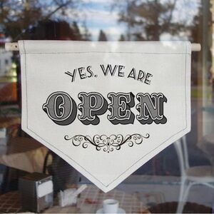 White 'Yes, We Are Open' Sign